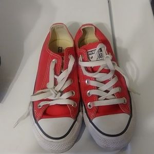 Worn Red Converse AllStars shoes. Women 5. Men 3